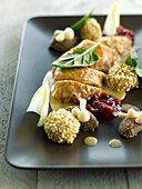 Bresse hen in cider,cranberry sauce,golden mushrooms,anchoyade quenelles and crunchy pearl barley croquettes