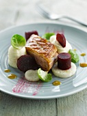 Roast duck with beets and beetroots