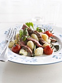 Gnocchis with beef fillet and cherry tomatoes