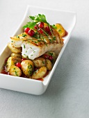 Grilled cod with roasted potatoes with redcurrants in syrup