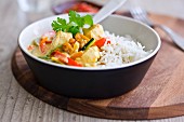 White rice and chicken with coconut milk and vegetables
