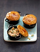 Smoked salmon casseroles sealed with pastry