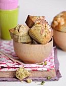 Mini pistachio and thinly sliced almond cakes