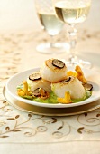 Scallops with chanterelles, truffles and pea puree