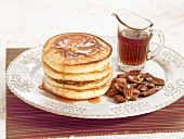 Pancakes with maple syrup and pecans