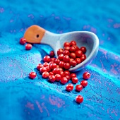 Spoonful of pink peppercorns