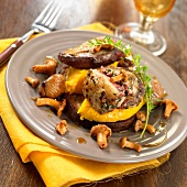 Stuffed pigeon with chestnuts and chanterelles, pumpkin mash
