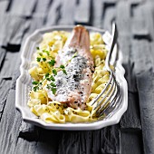 Trout with creamy black mushroom sauce and tagliatelles