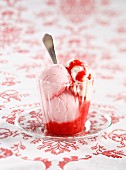 Strawberry ice cream, strawberry sauce and whipped cream