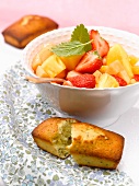 Fruit salad with poppyseed-lemon mini cakes