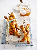 Flaky pastry twists with orange marmelade