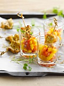 Marinated chicken mini brochettes, diced mangoes and tomatoes