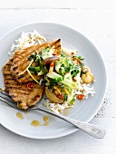 Asian-style grilled veal escalope and rice with sauteed vegetables
