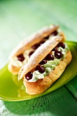 Éclair with pistachio whipped cream and Griottines