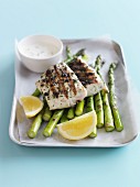 Grilled snapper with green asparagus and white sauce