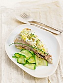 Monkfish tail with spring onions and thin strips of zucchinis