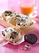 Meringue sprinkled with crushed Oreo biscuits