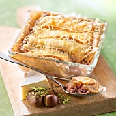 Potato, ham, chestnut and Reblochon cheese-topped dish