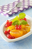 Preserved apricots with redcurrants