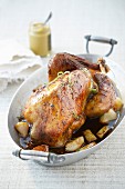 Roasted guinea-fowl with mustard and spring onions