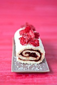 Chocolate and raspberry rolled sponge cake