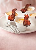 Coodled egg with parmesan and grilled bacon