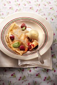 Crepe with raspberries and vanilla ice cream