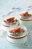 Vanilla-flavored panna cotta with stewed figs and pistachios