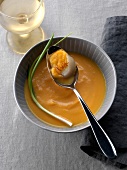 Cream of pumpkin soup with scallops