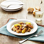Thinly sliced chicken breasts with sauteed potatoes