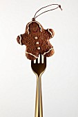 Christmas gingerbread man to hang on the end of a fork