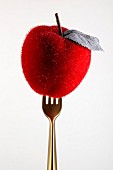 Decorative apple on the end of a fork