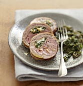 Rolled fillet of lamb stuffed with stewed spinach and Fromage frais