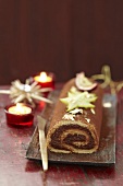 Bûche (French log cake) with chocolate and passion fruit
