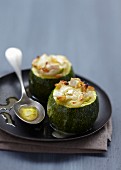 Round zucchinis stuffed with small onions,pine nuts and Brie de Nangis