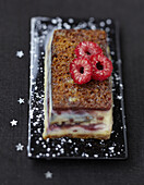 Bûche (French log cake) made with gingerbread and raspberry cream