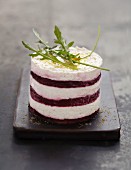 Layered beetroot slices and goat's cheese Palets