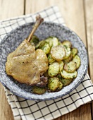 Duck confit with potatoes with parsley