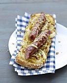 Onion and chipolatas grilled open sandwich