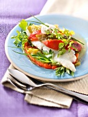 Layered halibut,peppers and fresh herbs with roasted pink garlic