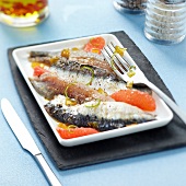 Marinated sardines with grapefruit and lime zests