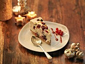 Cheesecake with mascarpone, chocolate chips, cranberries and pistachios for Christmas
