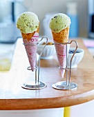 Pistachio and chocolate chip ice cream cones
