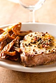 Veal Granadin with pepper and french fries