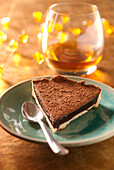 Slice of bitter chocolate and Cognac pie