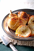 Roasted chicken leg with juicy apples