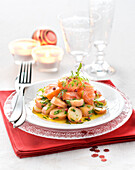Potato salad with salmon marinated in oil,dill and pink peppercorns