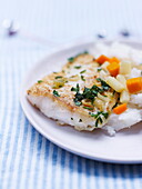 Simmered salt-cod with white polenta and small winter vegetables