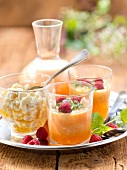 Melon soup with raspberries and Brousse cheese with honey