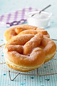 Brezel-shaped sugar donuts
